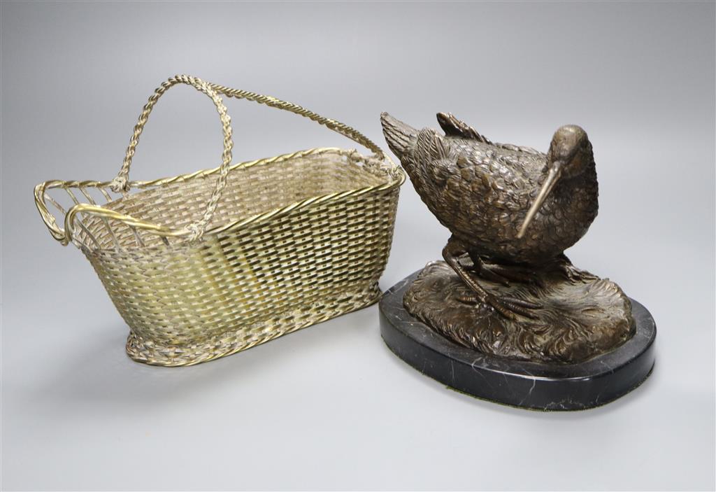 A Christofle silver plated wine basket, length 24cm and a bronze model of a wading bird, on oval marble plinth, 16cm